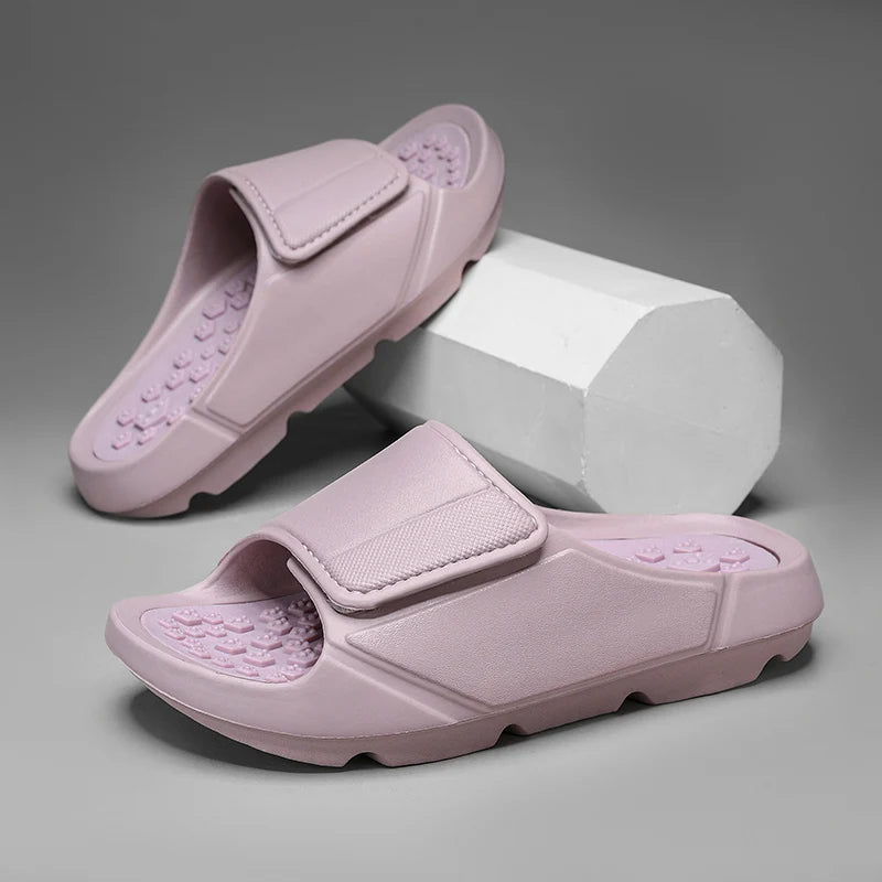 EVA sliders with a wide adjustable strap, a footbed of small nubs and a thick sole - lilac