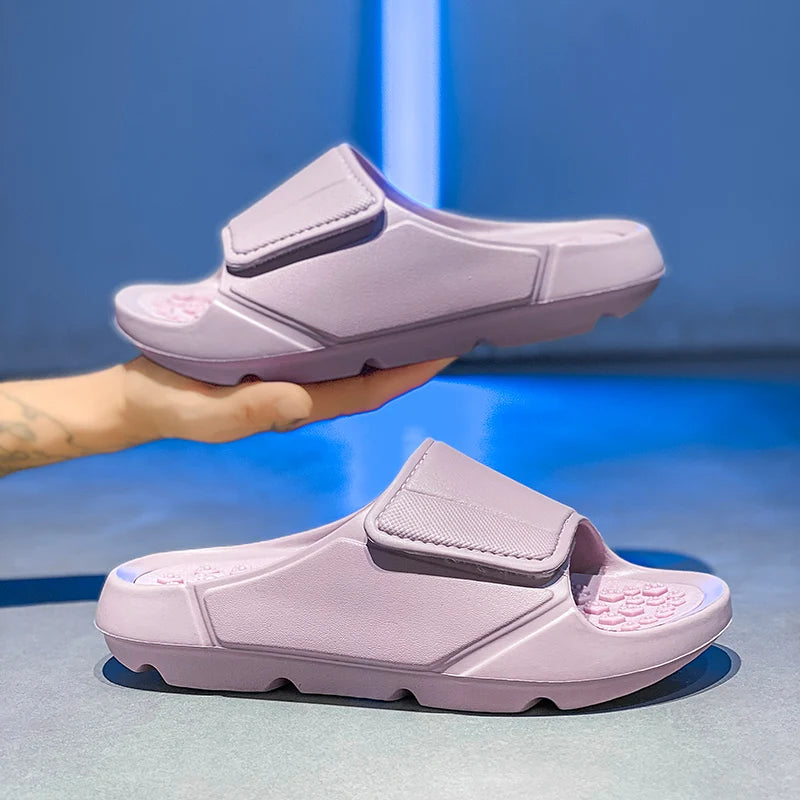 EVA sliders with a wide adjustable strap, a footbed of small nubs and a thick sole - view 4