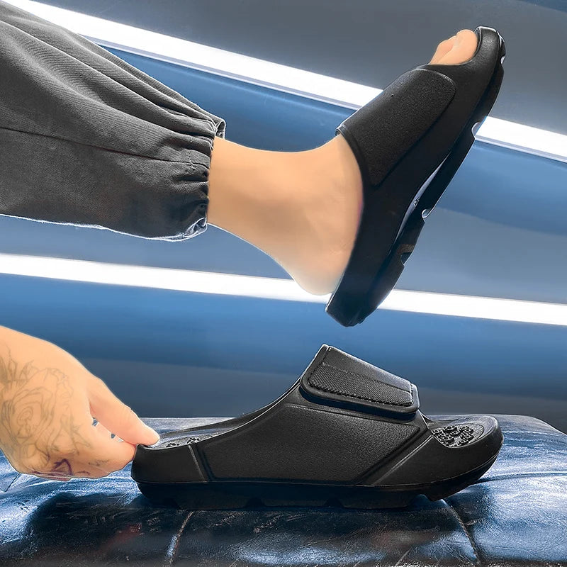 EVA sliders with a wide adjustable strap, a footbed of small nubs and a thick sole - view 5