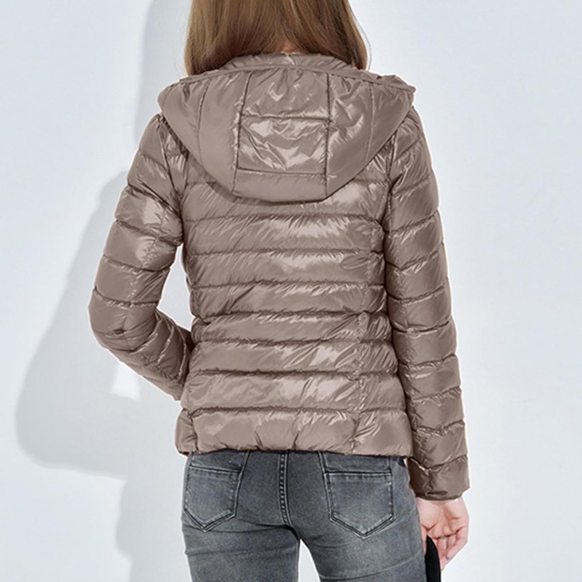 Women's slim lightweight puffer jacket with narrow quilting and a hood