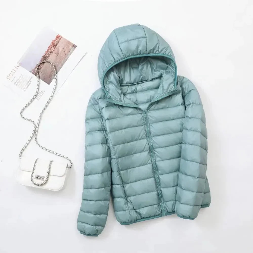Women's slim lightweight puffer jacket with narrow quilting and a hood - aqua blue