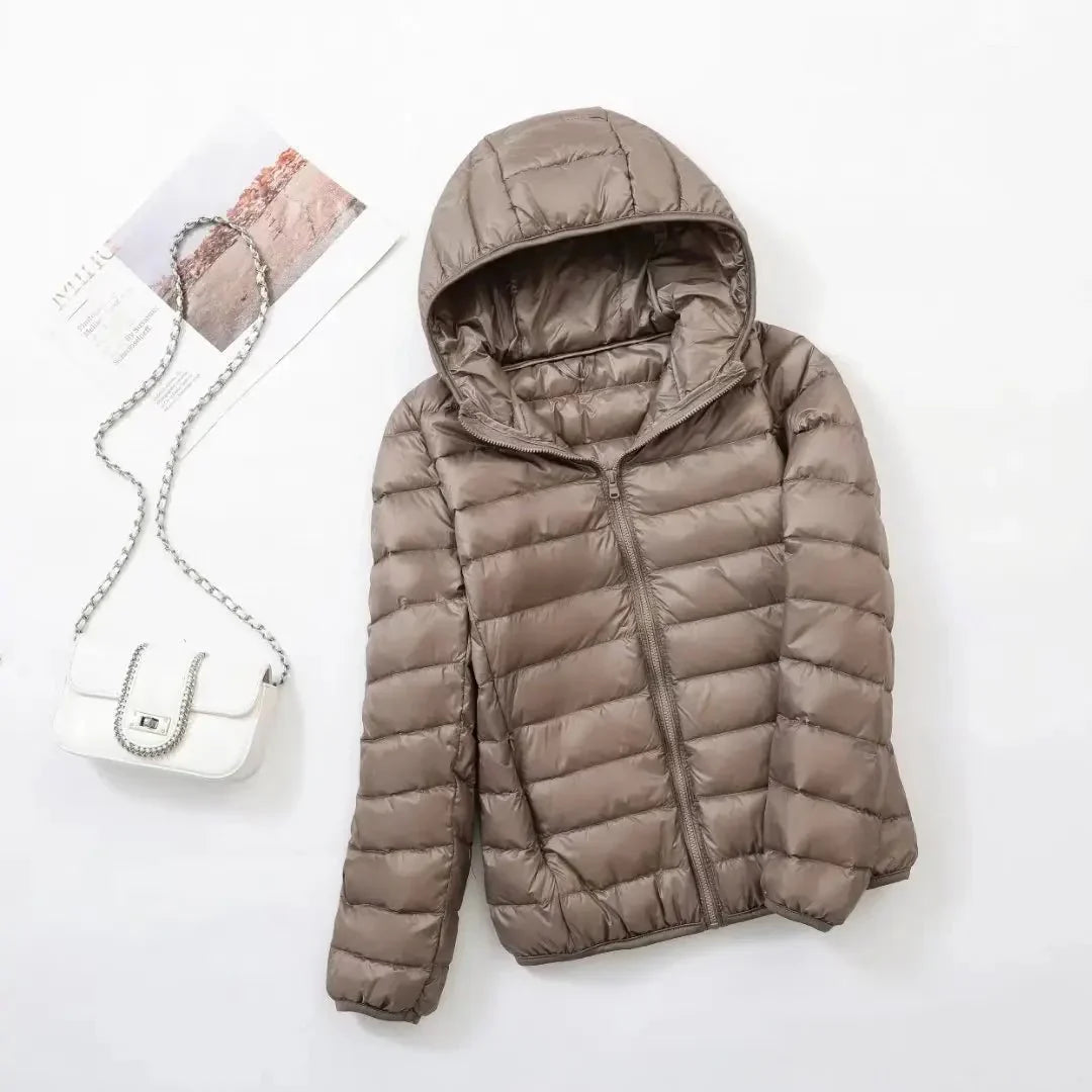 Women's slim lightweight puffer jacket with narrow quilting and a hood - taupe