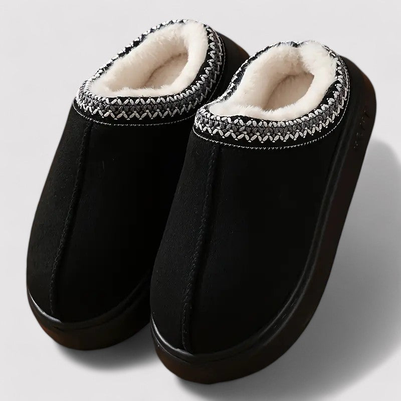 Slip-on slippers in a suede look with teddy lining, woven trim and a thick sole