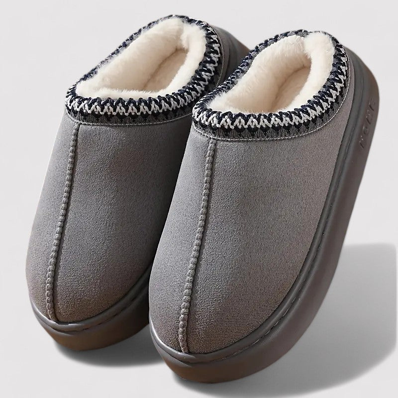 Slip-on slippers in a suede look with teddy lining, woven trim and a thick sole