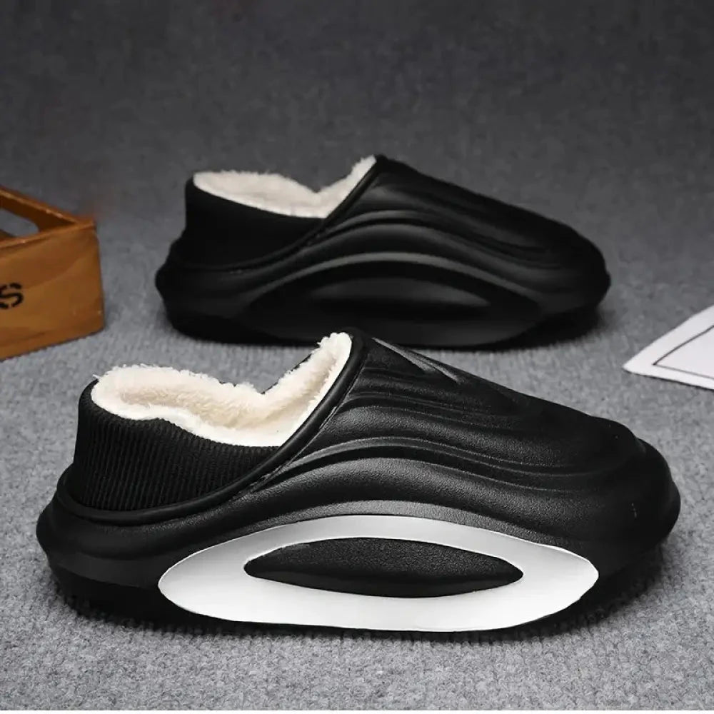 Slippers in EVA with wavy thick sole, plush lining and ribbed heel collar