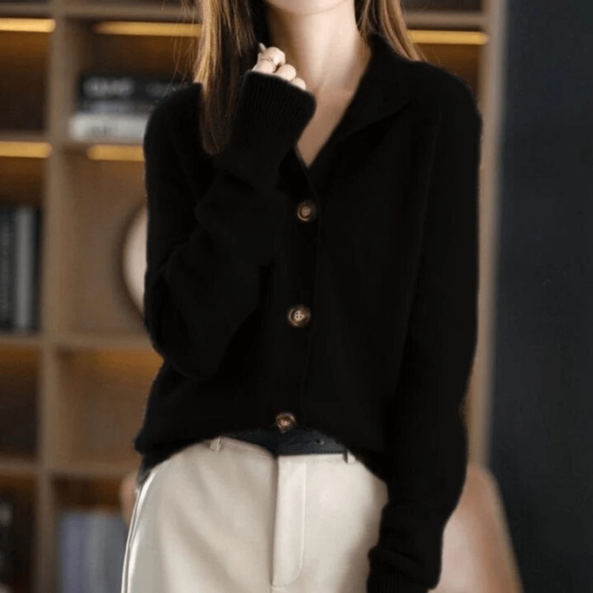 Women's soft knit cardigan with a convertible collar and brown buttons - black