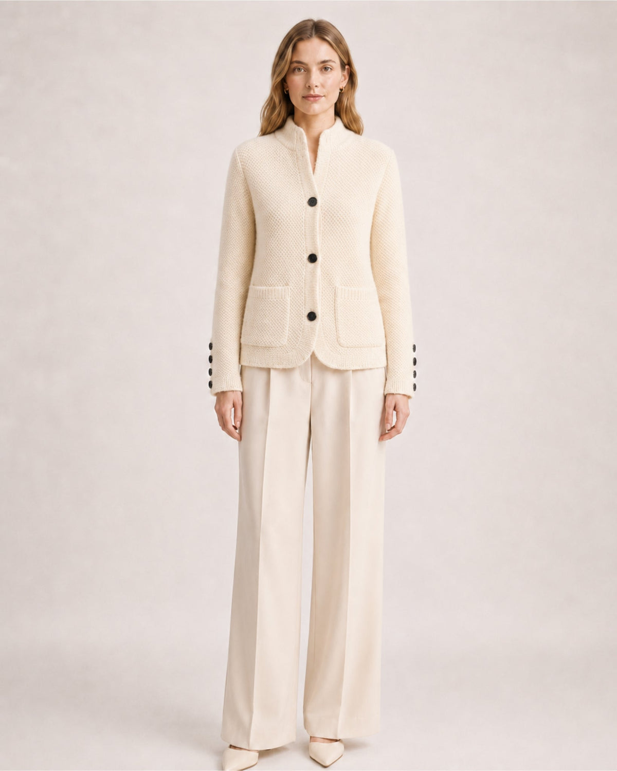 Women's firm knit cardigan with a stand collar and patch pockets