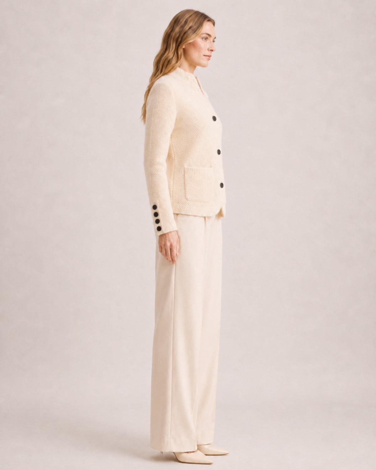 Women's firm knit cardigan with a stand collar and patch pockets