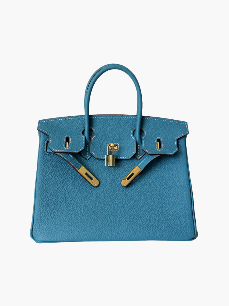 Structured top handle bag with two rolled handles, a flap with turn lock and a padlock - petrol blue