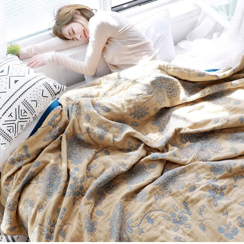 Summer blanket with a jacquard floral pattern over a sofa - view 2
