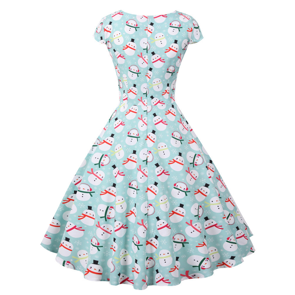 Women's swing Christmas dress with a wrap neckline, cap sleeves and full skirt