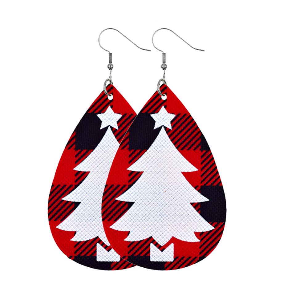 Faux leather teardrop Christmas earrings with a festive print on hooks - white tree on red check