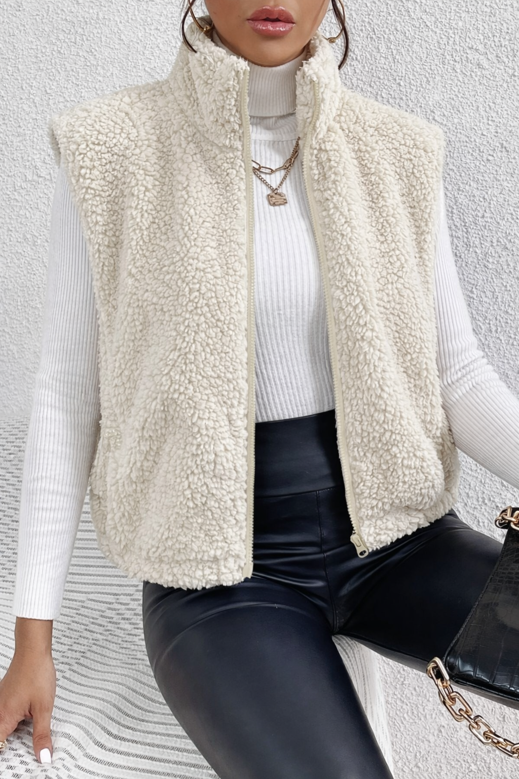 Women's teddy gilet with a high stand collar, full-length zip and side pockets - cream