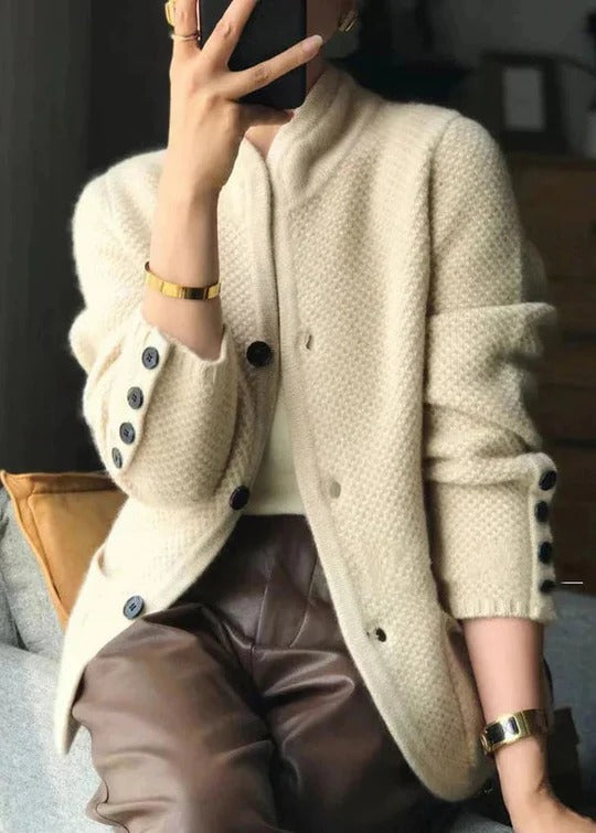Women's textured knit cardigan with a stand collar and buttoned cuffs