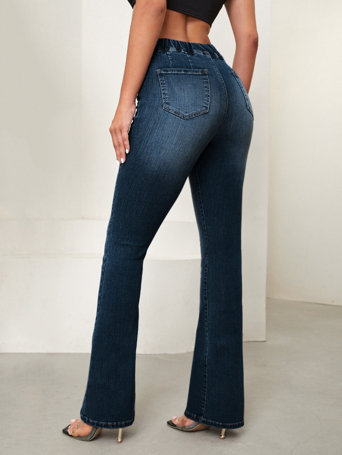 Thermal lined flared jeans for women with a V-shaped waistband - view 8