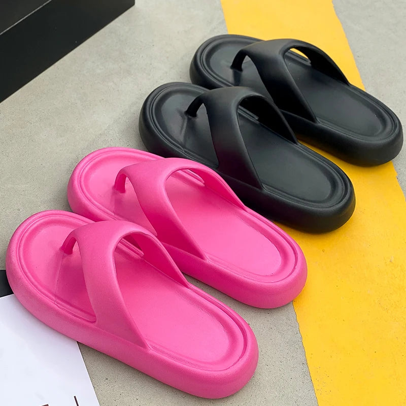 Flip flops with a thick, soft EVA sole and a wide flat toe strap - view 4