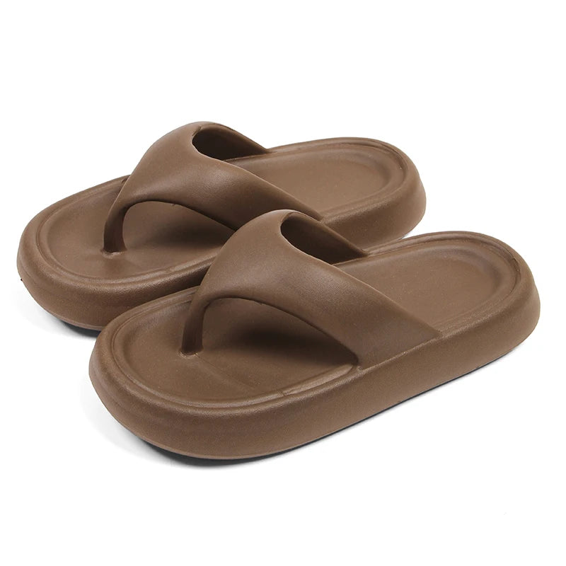 Flip flops with a thick, soft EVA sole and a wide flat toe strap - brown