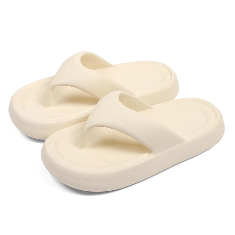 Flip flops with a thick, soft EVA sole and a wide flat toe strap - cream