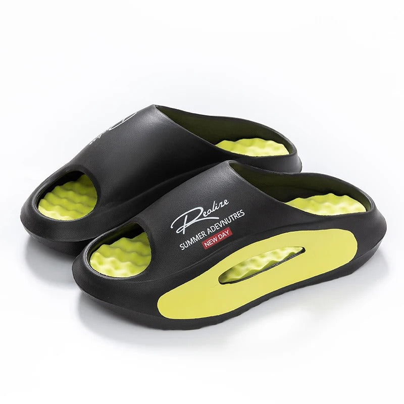 EVA sliders with a wavy footbed in a contrasting colour and thick sole - black / green