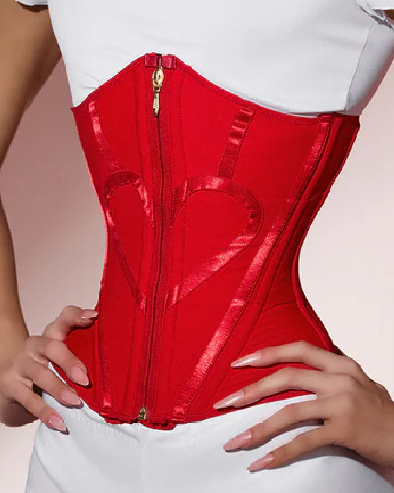 Underbust corset with a front zip, boning and heart-shaped trim