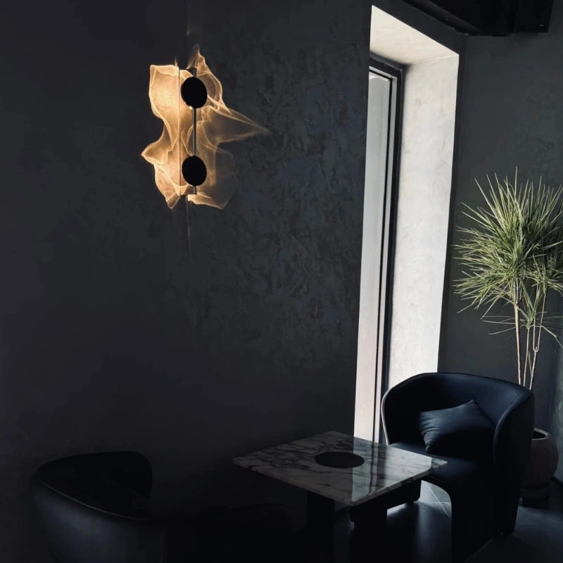 Wall light with a round disc casting a rippled light pattern on the wall - view 10