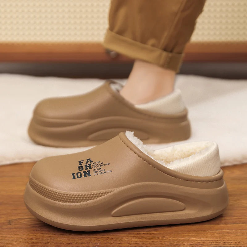Platform slippers with a smooth upper, plush lining, open heel and high sole