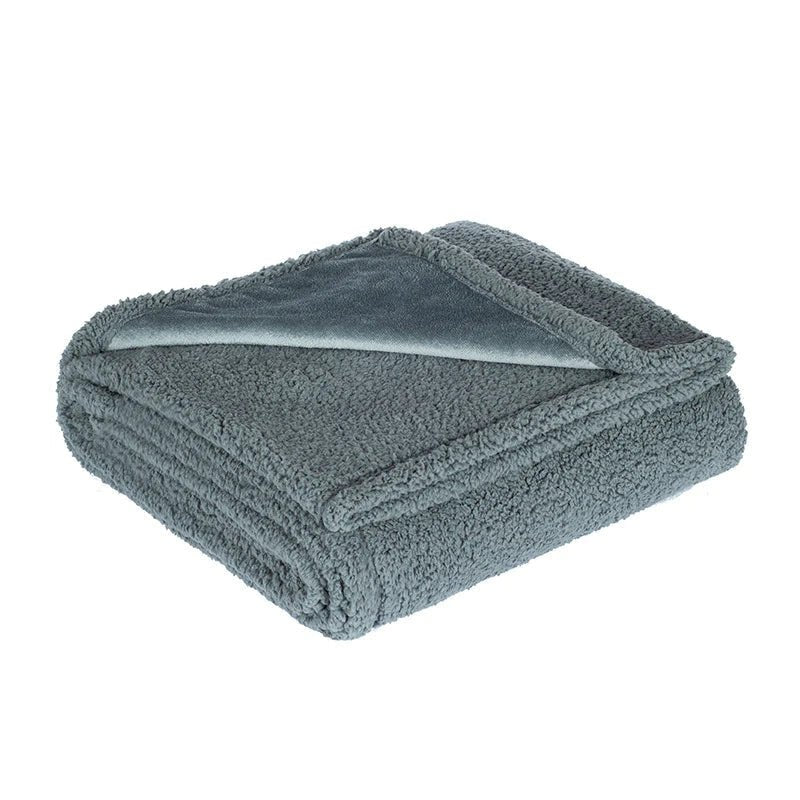 Waterproof teddy fleece throw, folded with the smooth side showing - grey