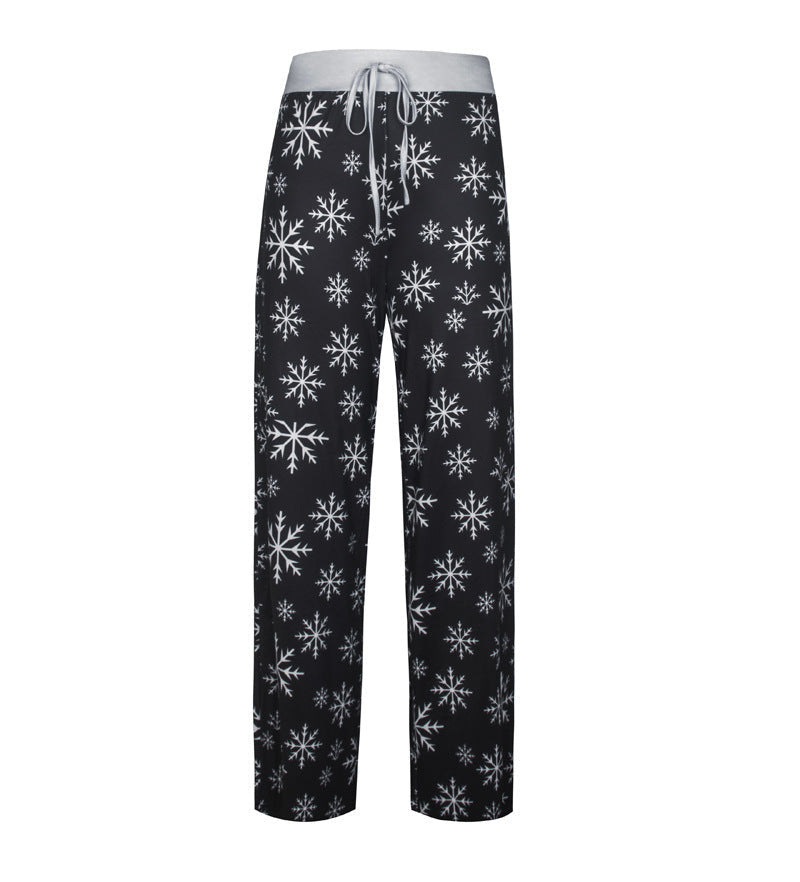 Women's wide-leg Christmas trousers with a high drawstring waist and festive print
