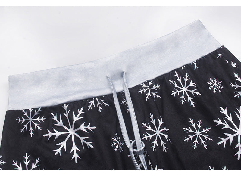 Women's wide-leg Christmas trousers with a high drawstring waist and festive print