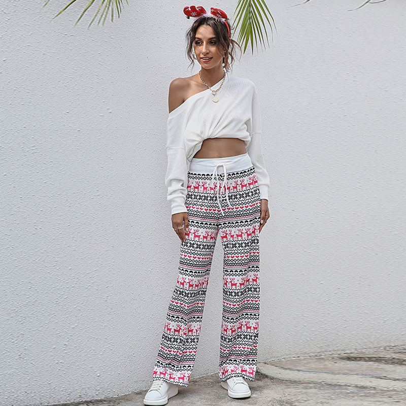 Women's wide-leg Christmas trousers with a high drawstring waist and festive print - white and pink fair isle