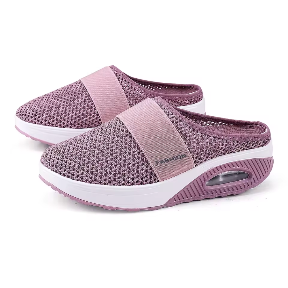 Women's backless mesh trainers with an air cushion sole
