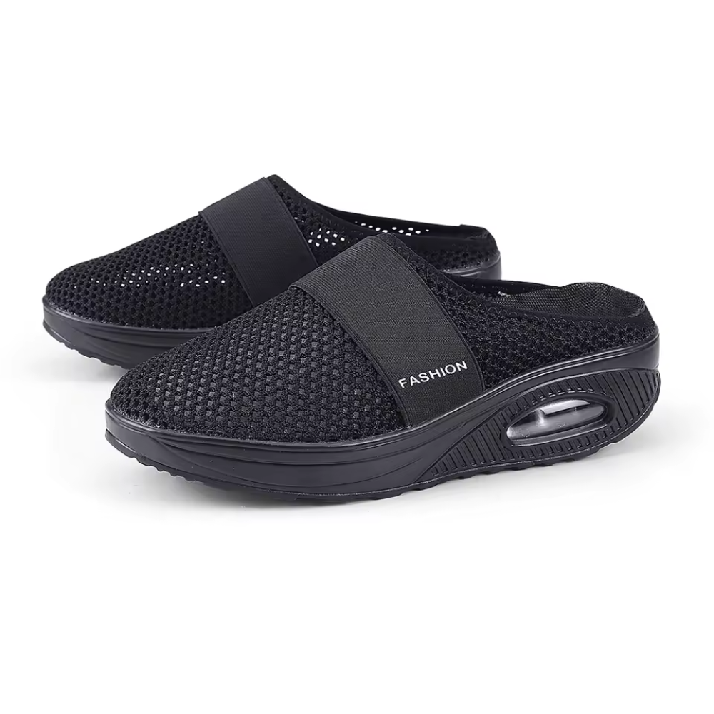 Women's backless mesh trainers with an air cushion sole