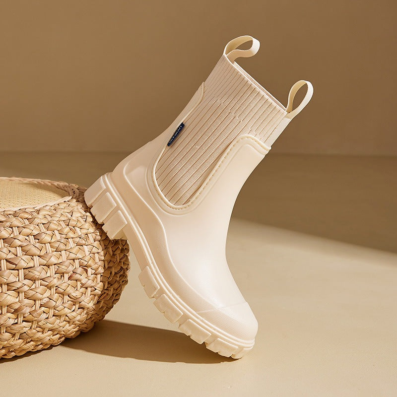 Women's Chelsea rain boots with a ribbed knit collar and lug sole - view 3
