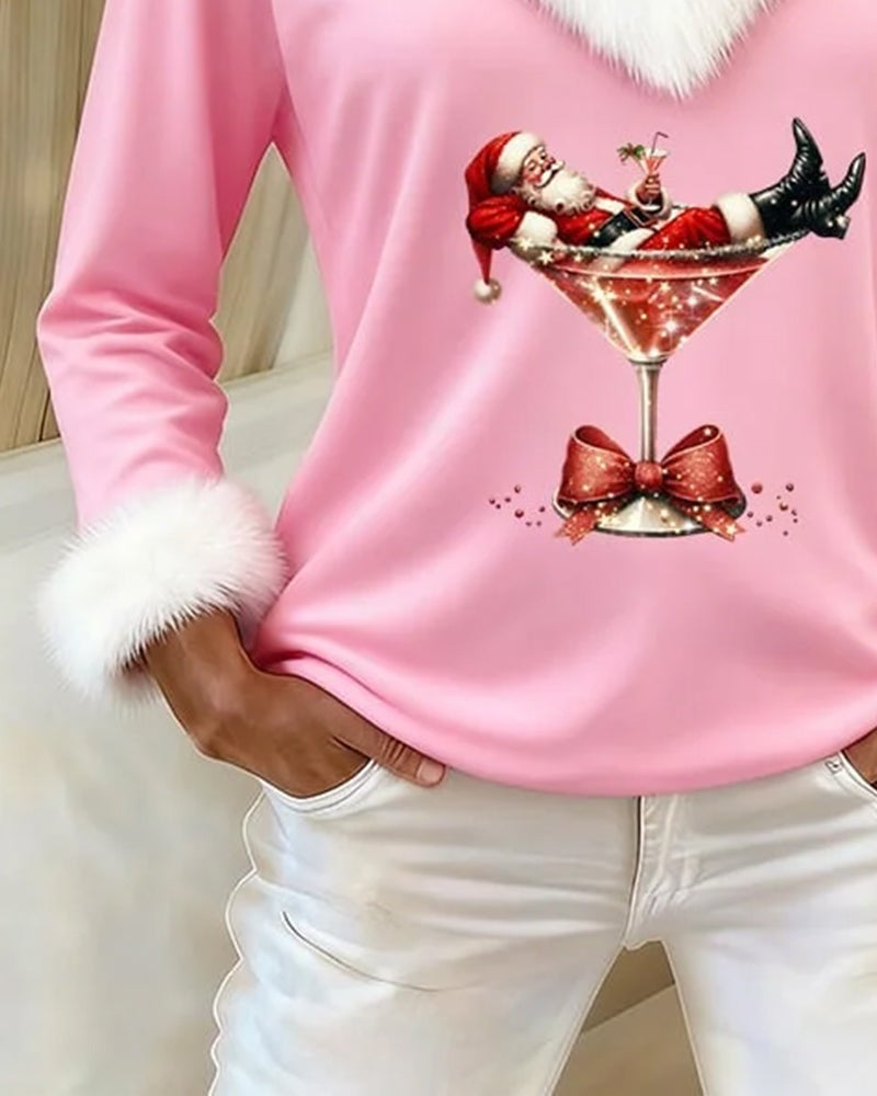 Women's Christmas top with a V-neck, fluffy white trim and Santa print - pink