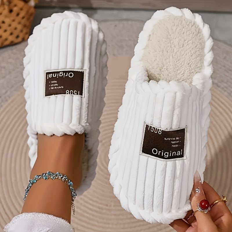 Corduroy slippers for women with plush lining, open heel and a dark woven label on the toe - white