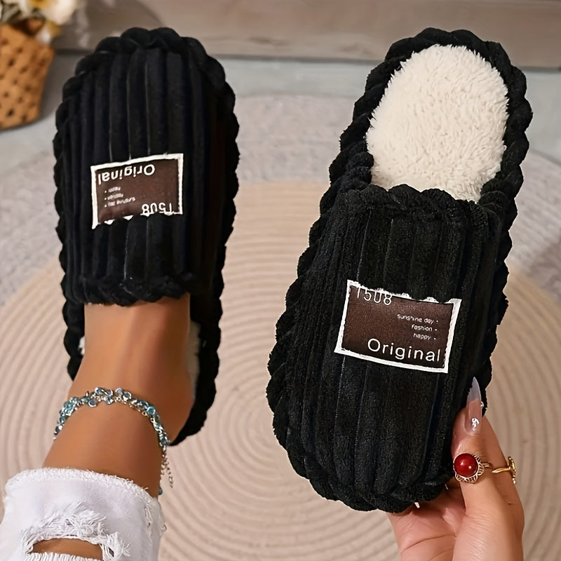 Corduroy slippers for women with plush lining, open heel and a dark woven label on the toe - black
