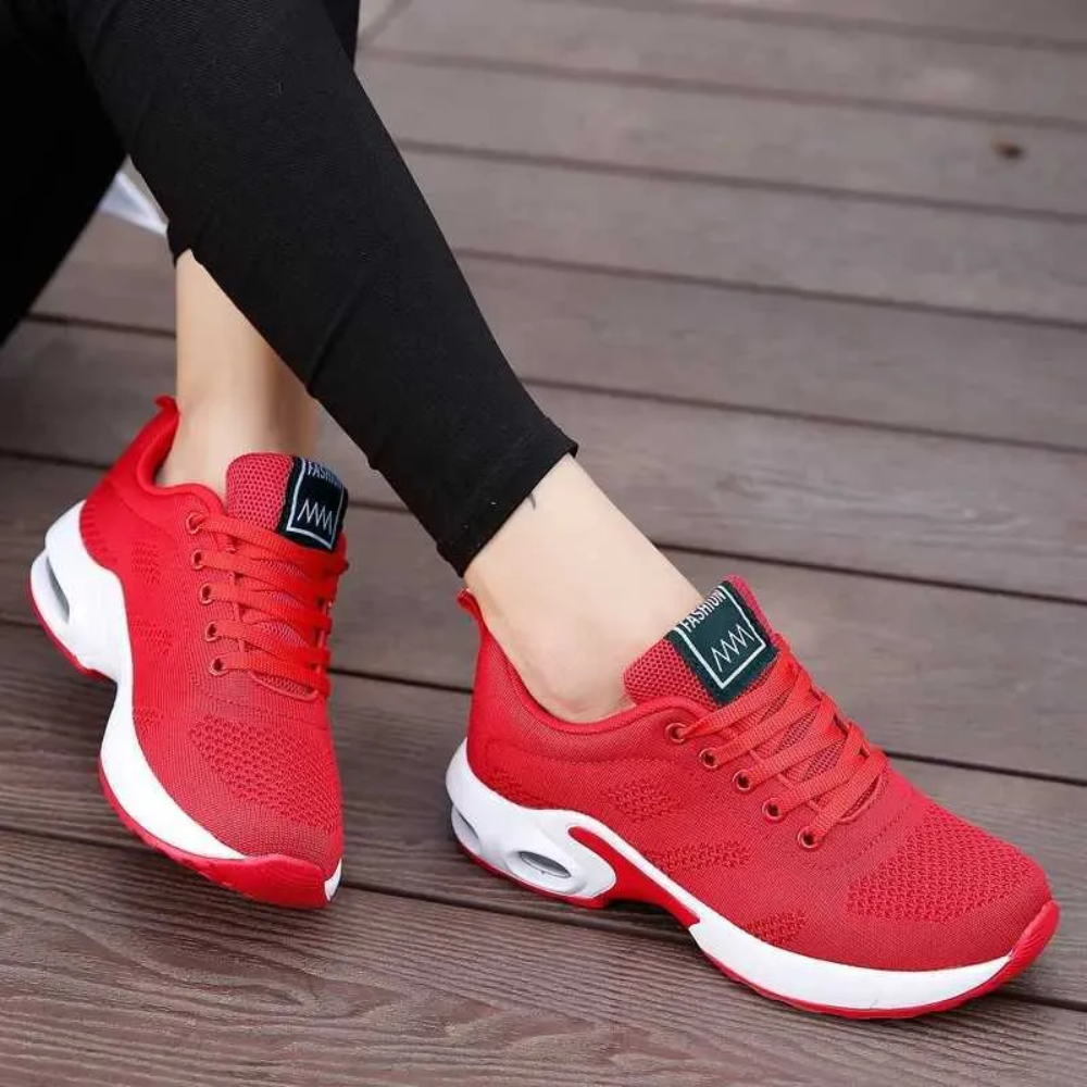 Women's ergonomic knit trainers with an air cushion sole