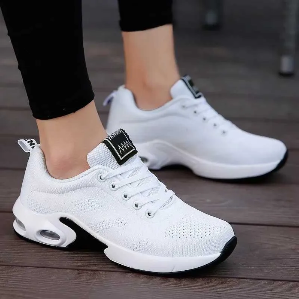 Women's ergonomic knit trainers with an air cushion sole