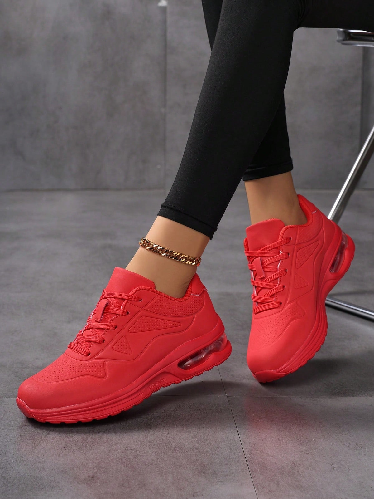 Faux leather lace-up trainers for women with chunky tread and visible air cushion in the heel - view 10