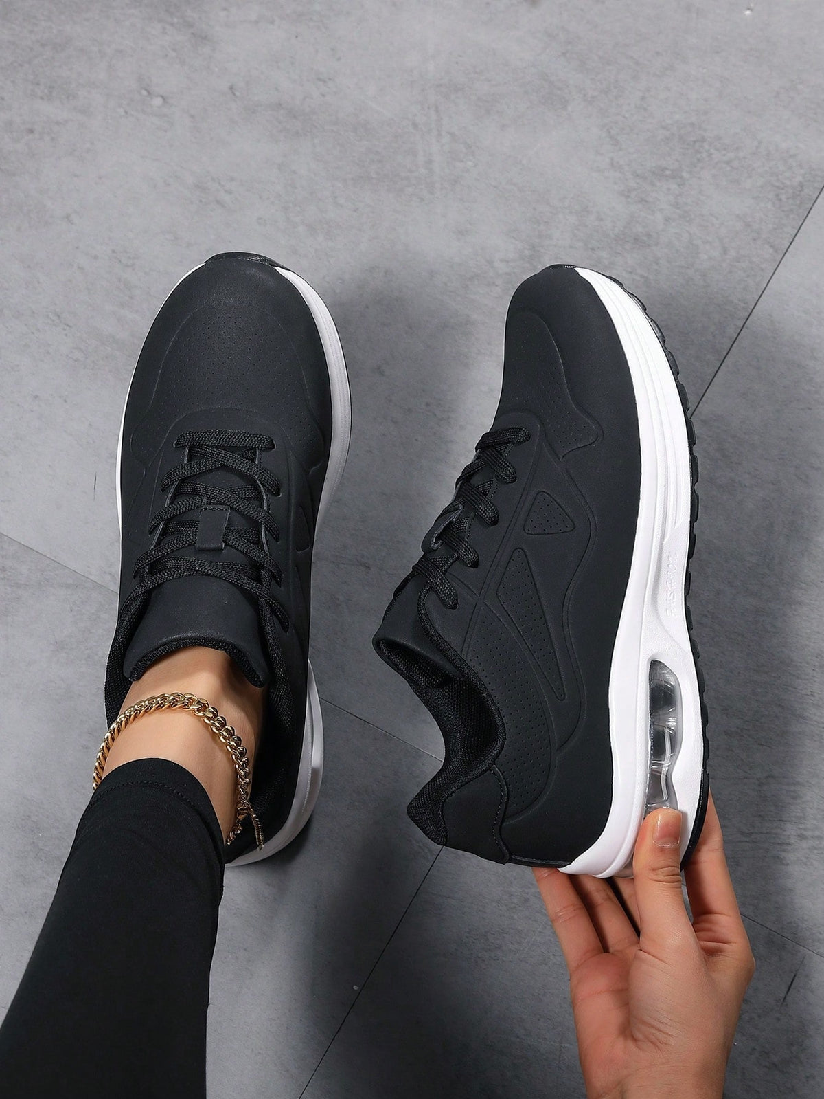 Faux leather lace-up trainers for women with chunky tread and visible air cushion in the heel - view 9