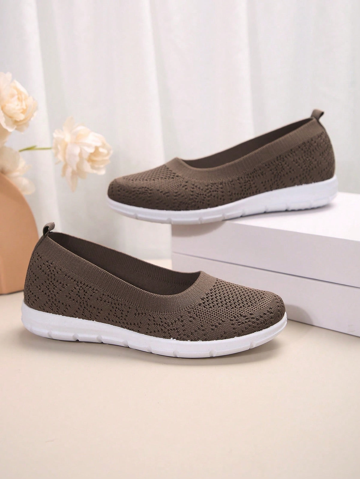 Flat knit shoes for women with low slip-on cut, heel pull tab and flexible tread sole - brown