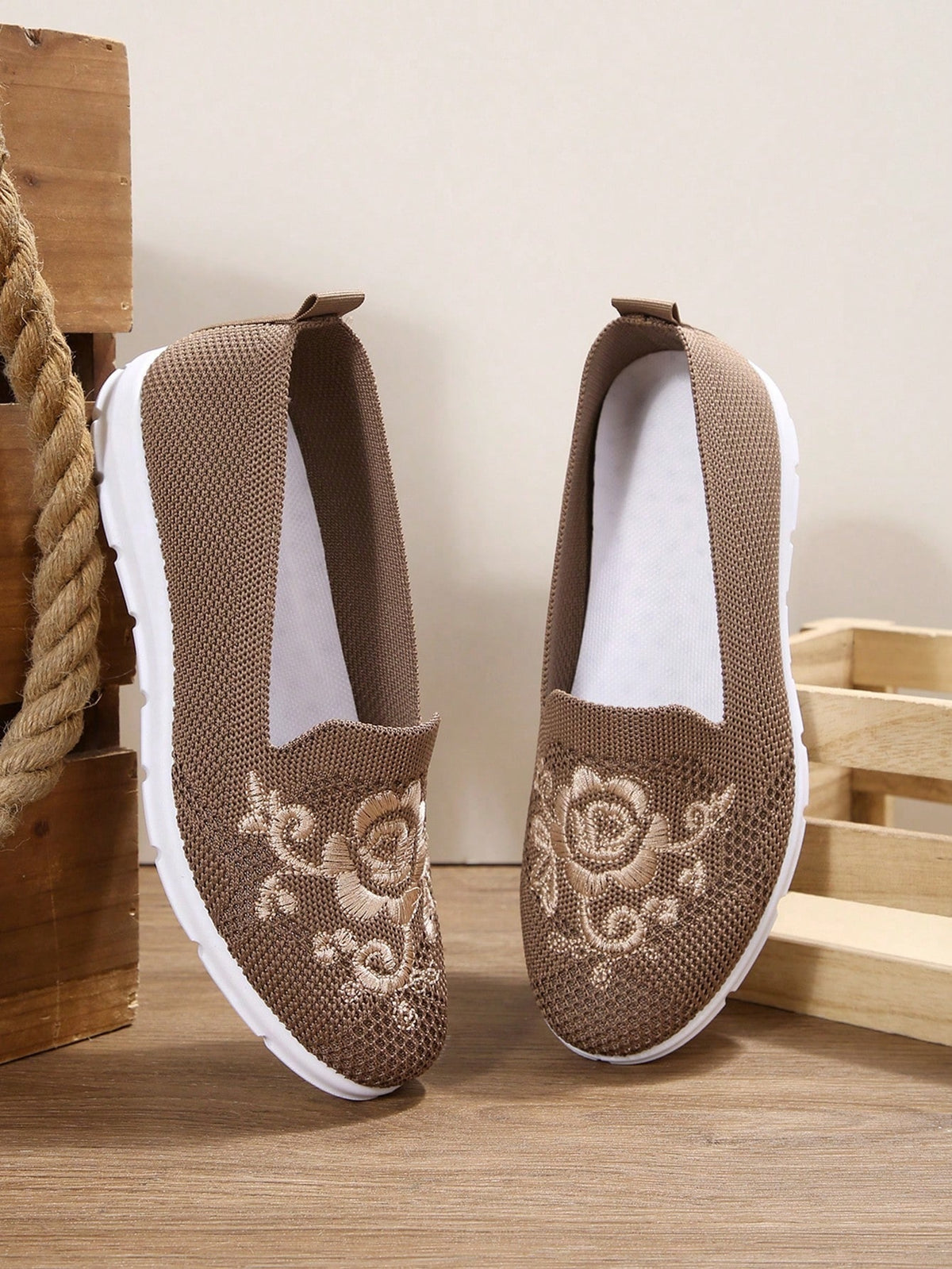 Flat knit shoes for women with low slip-on cut, heel pull tab and flexible tread sole - brown embroidered