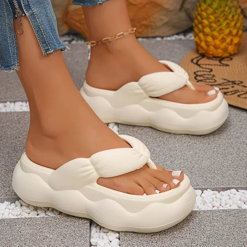 Flip flops in EVA with a puffy ruched strap and a high wavy platform sole - view 4