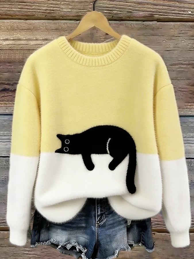 Women's fluffy jumper with a black cat print and a cream lower half - pale yellow