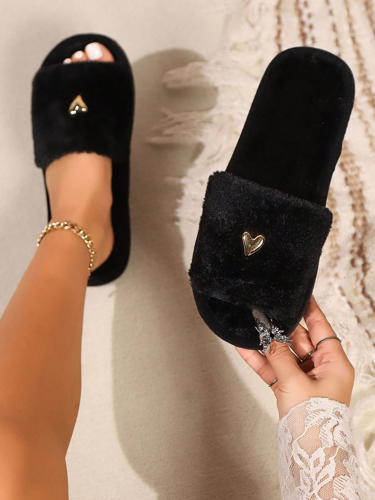 Fluffy sliders for women with a wide black plush strap and a small gold heart on top - black with gold heart