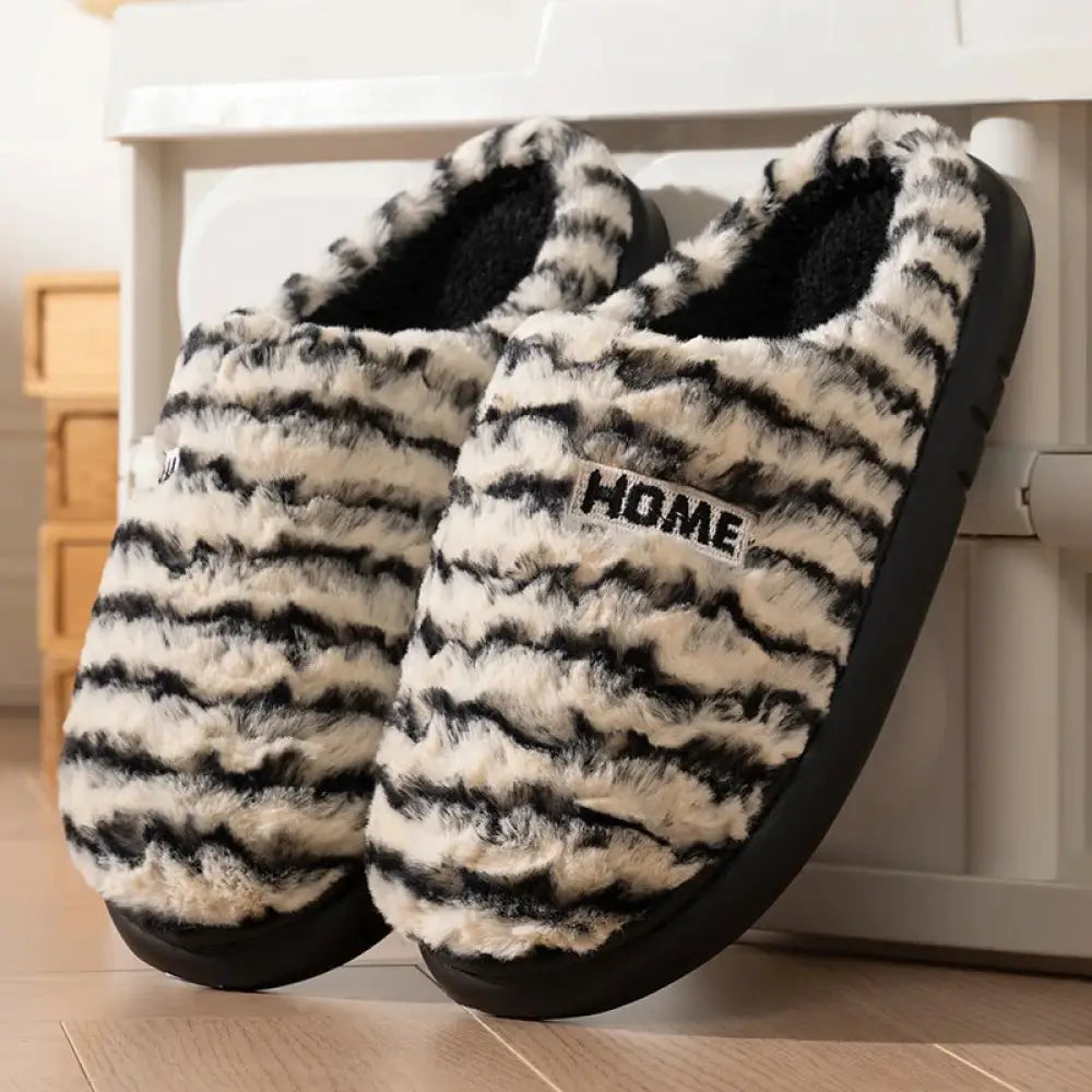Fluffy slippers in striped plush with soft sole and open heel - black