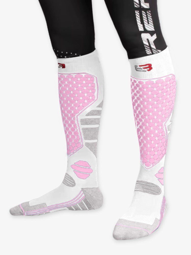 Women's knee-high ski socks with a honeycomb panel and reinforced heel and toe - white/pink