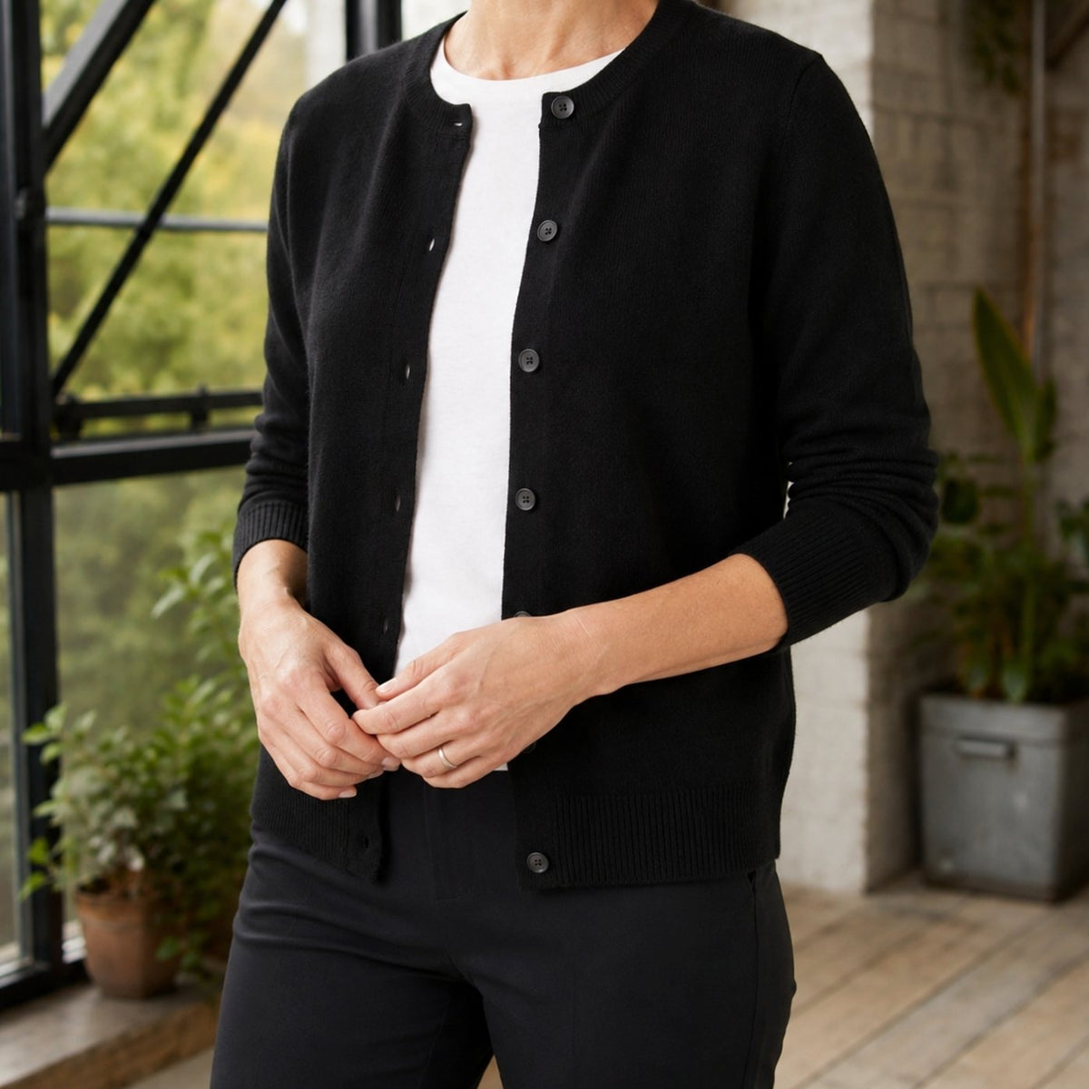 Women's knitted cardigan with a round neck and full button front - black
