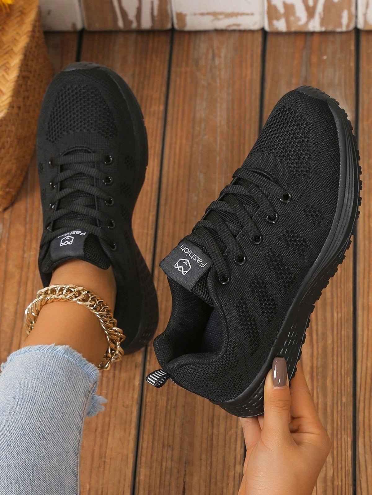 Lightweight lace-up trainers for women with openwork knit upper, soft tongue and EVA sole - black