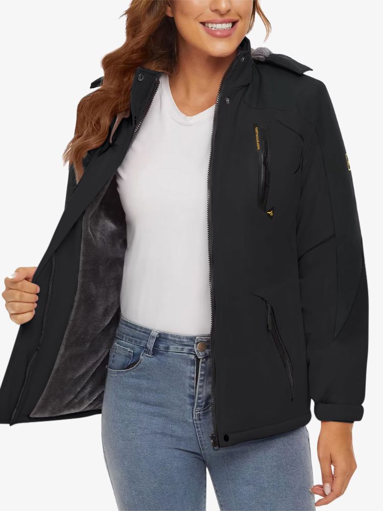 Women's ski jacket with fleece lining, a hood and zipped pockets - view 2